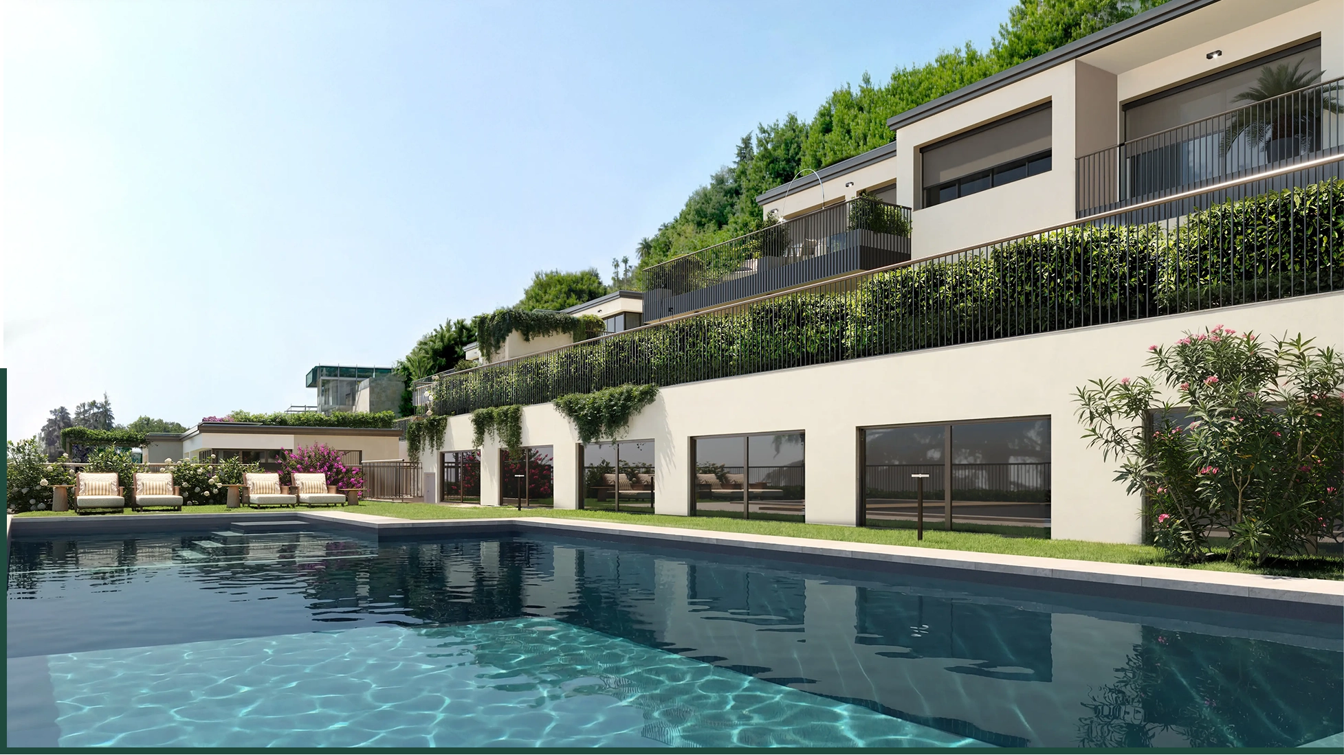 Modern stone and stucco house with large glass windows, balconies with plants, lawn chairs, and a clear blue outdoor swimming pool under a sunny sky.